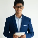 an indian employee holding his documents
